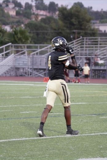 Ajani during his pregame warmups at Canyon High School