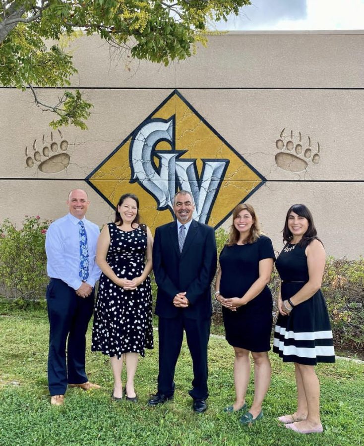 Golden Valleys principal, Mr. Frias, and the assistant principal team, Dr. Delgado, Mr. Necessary, Ms. Ambrose, and Ms. Landeros, beside the Golden Valley Logo.