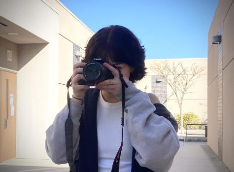 Natasha Pebley with her yearbook camera.