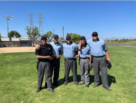Donovan Swanson (far right), Warren Goenner Jr. (next to Donovan), Trevor Dockery (middle), Josh Moreno (next to Trevor), and Colin Ruiz (far left) celebrate their last day of umpire training by taking a picture together.