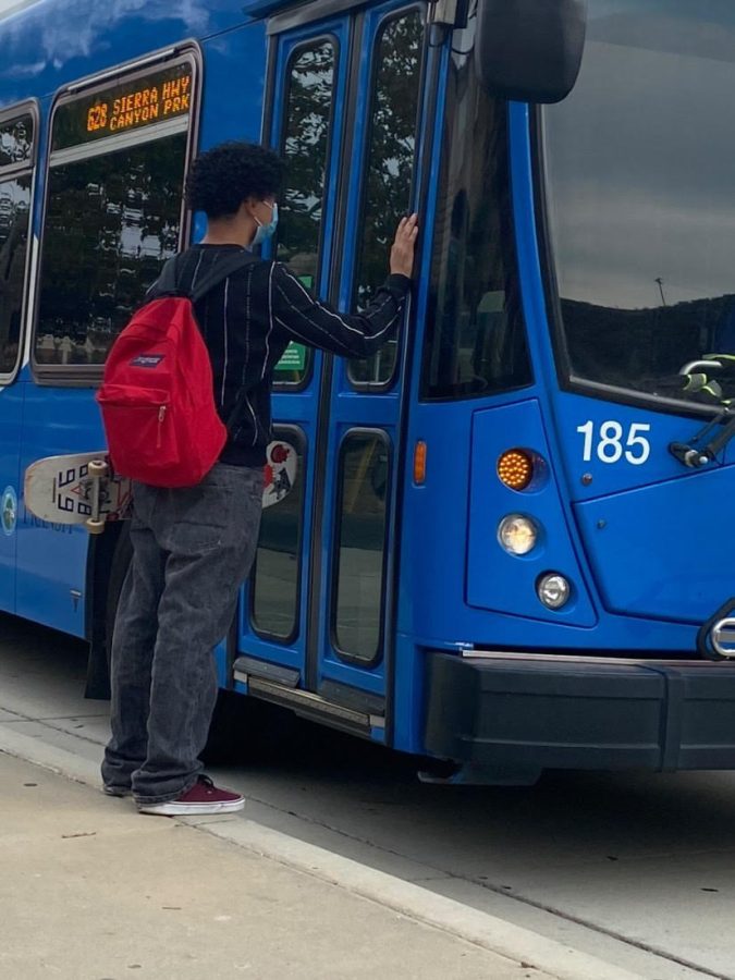 GV Student Abraham Bracamontes prepares to board an LA public bus in Canyon Country on November 1, 2021