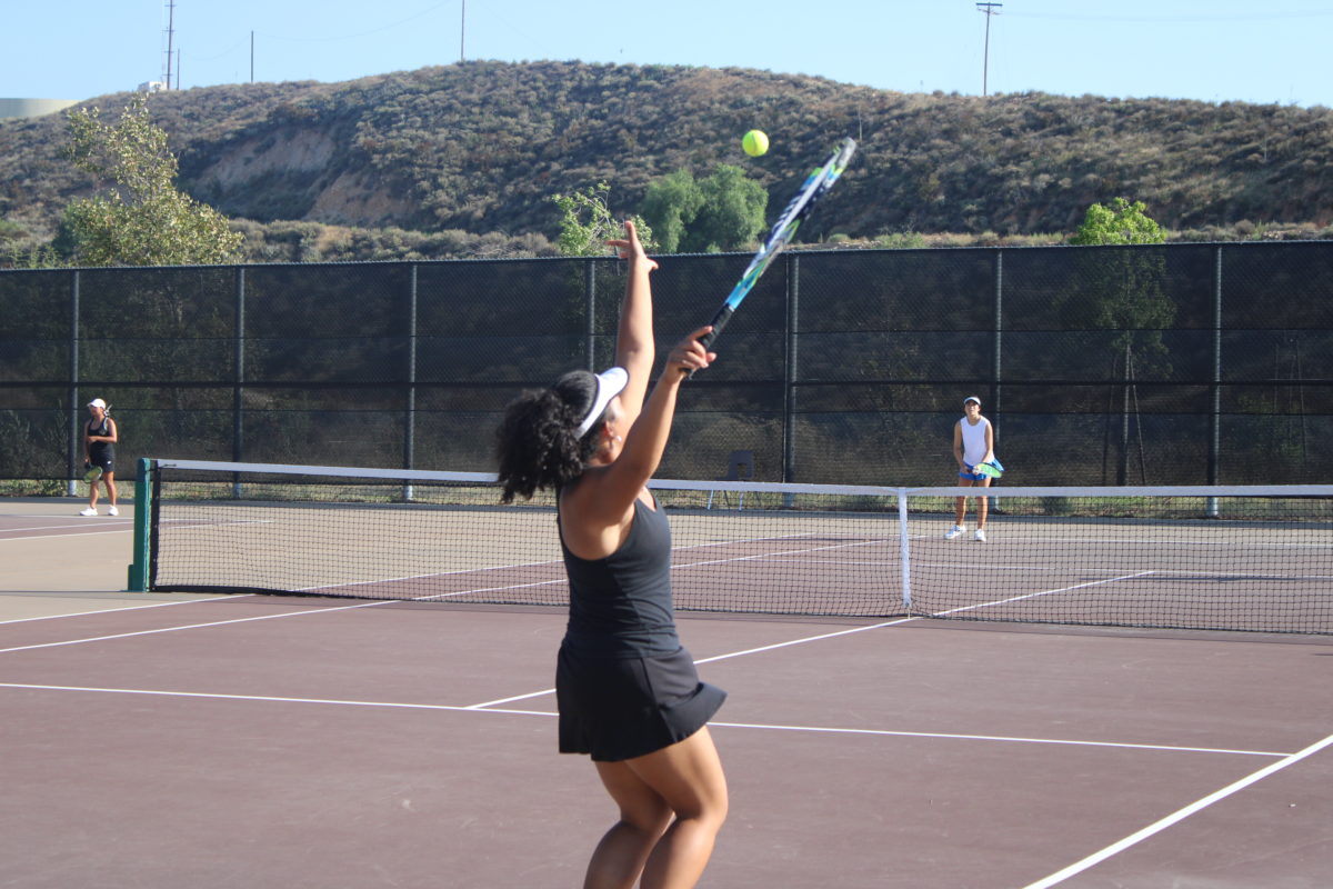 Bella singles player winning serve on September 14th.