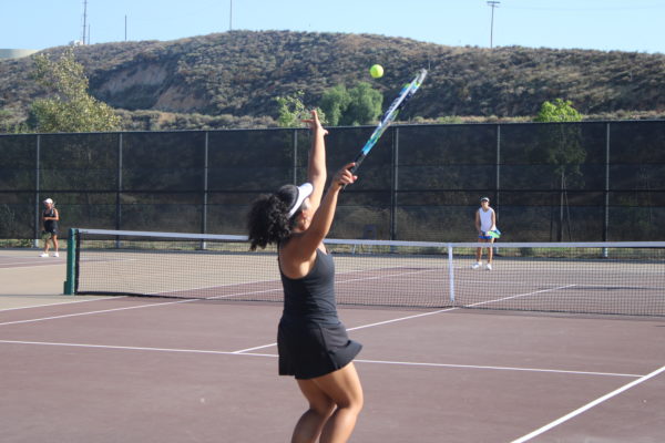 Bella singles player winning serve on September 14th.