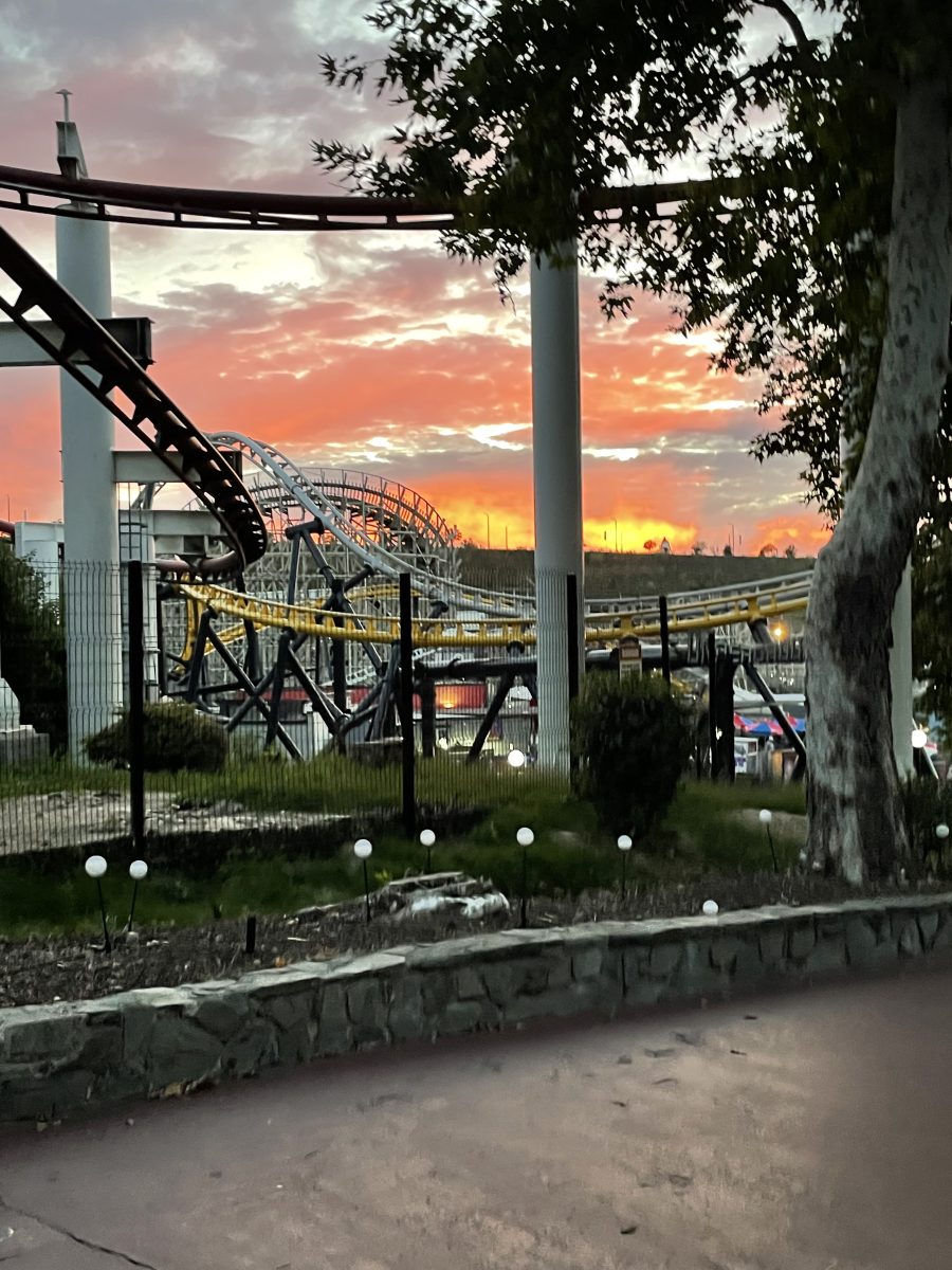 Beautiful sunset behind the ride West Coast Racers at Six Flags Magic Mountian.