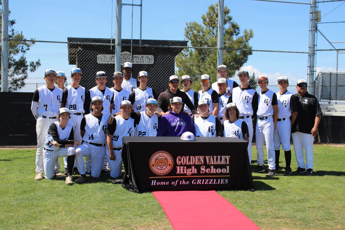 Brandon Wright with entire GV Baseball team, as they support him for his signing to Goshen College